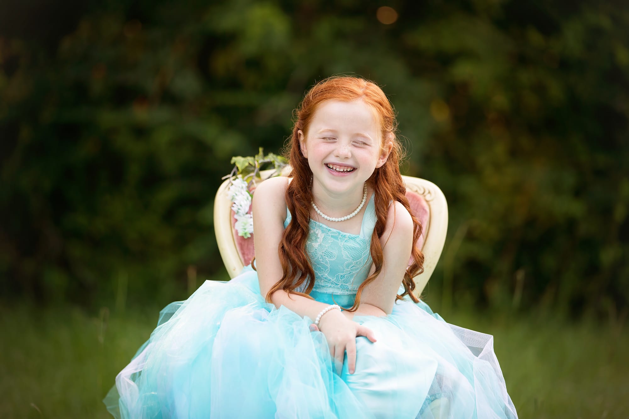 girl in chair outside beautiful children